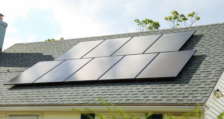 House During The Day With All Black Solar Panels